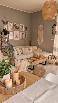 a living room filled with lots of furniture and decor on top of a wooden table