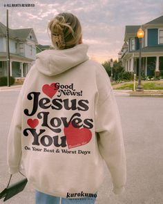 This Unisex hooded sweatshirt features "Good News! | Jesus Loves You On Your Best & Worst Days | Remember that" with hearts on the back and front. So many people are in dire need of God in their lives. Spread a hopeful message of God's love and mercy with this Christian hoodie <3 Make sure to check out the other garment options below :) » O P T I O N S « ‣ Tshirt: https://www.etsy.com/listing/1639514915 ‣ Crewneck: https://www.etsy.com/listing/1625225116 ‣ Tote Bag: https://www.etsy.com/listing/1748626737 » A B O U T « ‣ This item is made to order using direct-to-garment (DTG) printing technology. This digital process involves the printer inks being jetted or sprayed onto the textile by a print head after the garment goes through a pre-treatment machine to create a stronger bond between ga Winter Hoodie With Lettering And Long Sleeves, Christian Mental Health, Indie Sweater, Christian Clothes, Christian Clothing Brand, Faith Sweatshirt, Jesus Clothes, Christian Shirts Designs, Sweatshirt Y2k