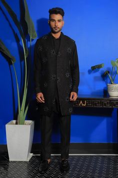 Black long sleeves bandhgala in silk base with all over buttercup flora embroidery using cut dana highlights. Paired with a kurta and trouser.
Components: 3
Pattern: Embroidery
Type Of Work: Buttercup
Neckline: Mandarin Collar
Sleeve Type: Long
Fabric: Silk, Stretch Cotton
Color: Black
Occasion: Cocktail and Reception - Aza Fashions Kurta Set Men, Types Of Work, Pattern Embroidery, Silk Embroidery, Fabric Silk, Kurta Set, Mandarin Collar, Black Silk, Aza Fashion