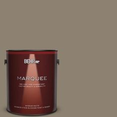 behr marquee interior paint in one gallon, with the light shining on it