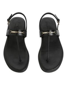 Leather Thong Sandals - Black - ARKET WW Luxury Gold T-strap Sandals, Leather Sandals With Gold-tone Hardware And Single Toe Strap, Designer Open Toe Sandals With Horsebit Detail, Gold Leather T-strap Sandals With Buckle, Elegant Leather Sandals With Horsebit Detail, Leather Boots Heels, Leather Thong Sandals, Black Leather Sandals, Straw Tote