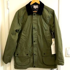 Five Four Oleary Jacket. Water Resistant Coating. Dual Zipper/Button Closure. Corduroy Lined Collar & Cuffs. Quilted Inner Liner For Extra Warmth. 4 Pockets (2 Hand Warmer Pockets & 2 Expandable Cargo Pockets). Color Olive Green. Size Medium. Brand New Condition Nwt. Solid Button-up Outerwear For Outdoor, Khaki Buttoned Outerwear For Cold Weather, Khaki Outerwear With Buttons For Cold Weather, Winter Utility Outerwear With Button Cuffs, Winter Utility Outerwear With Button Closure, Utility Outerwear With Button Closure For Winter, Classic Green Utility Jacket For Work, Classic Olive Button-up Outerwear, Winter Sport Coat With Buttons For Outdoor