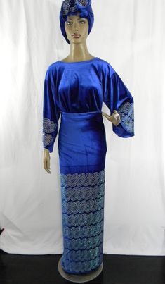 "Velvet With Stones Design/Nigerian Party Outfits/Trendy African Velvet Outfits/Ready Made Velvet 3 Piece Set Wrapper, Buba & Gele/Royal Blue Measured While Laying Flat: Size: L/56 Armpit to Armpit: 23.5\" (Full Chest: 47\") Shoulder To Bottom: 24.5\" Sleeve Length From Neckline: 22\" Wrapper: Wide: 68; Length: 49\" ~~Gele: L/56\" & W/18\" Size: XL/58 Armpit To Armpit: 24\" (Full Chest: 48\") Shoulder To Bottom: 25\" Sleeve Length: 22.5\" Wrapper: Wide: 70\"; Length: 50\" ~~ Gele: L/56\" Royal Fitted Party Sets, Blue Festive Evening Sets, Festive Evening Blue Sets, Festive Blue Evening Sets, Royal Style Long Sleeve Party Sets, Royal Long Sleeve Party Sets, Blue Evening Dress For Festivals, Fitted Blue Sets For Celebration, Royal Blue Party Sets