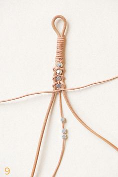 a piece of string with beads attached to it