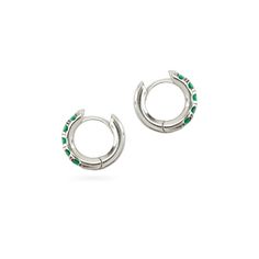 The Eternity Emerald Hoops, a pair of silver hoops featuring emerald accents. Modern Green Cubic Zirconia Jewelry, Fine Jewelry Green Sterling Silver Hoop Earrings, Sterling Silver Gemstone Huggie Earrings, Green Sterling Silver Huggie Earrings, Nickel-free Green Sterling Silver Hoop Earrings, Green Cubic Zirconia Tarnish Resistant Jewelry, Green Cubic Zirconia Tarnish-resistant Jewelry, Sterling Silver Hoop Earrings For May Birthstone, Green Sterling Silver Hoop Earrings For May Birthstone