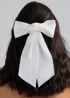 The Alicia Bow Barrette features wide grosgrain ribbon, fastened into an oversized bow of perfect proportions. A forever-favorite at Jennifer Behr, grosgrain ribbon lends a quiet elegance, making any look instantly memorable. Crafted by hand in New York, it fastens with an automatic French barrette closure, making it easy to wear in an endless number of hairstyles, in any type of hair. Quiet Elegance, Luxury Hair Accessories, Bow Barrette, Grosgrain Ribbon Bows, Jennifer Behr, French Barrette, Luxury Hair, Wigs Hair Extensions, Bridal Shop