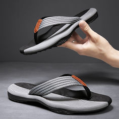 The sturdy yet flexible sole ensures stability and durability. Whether you're lounging at home or stepping out for a casual outing, these slippers offer a cozy and versatile option for your feet. Mens Flip Flops Fashion, Mens Thong Sandals, Cruise Attire, Men Flip Flops, Man Wear, Men Slippers, Slippers For Men, Sandals For Men, Soft Design