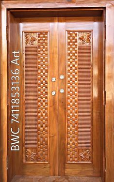 a wooden door with decorative carvings on it