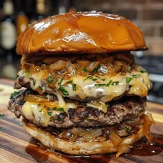 a cheeseburger on a wooden cutting board