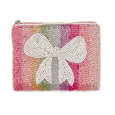 a small purse with a bow on the front and sequins on the back