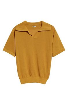 Inspired by a polo from the '70s, this mustard-hued style in a breathable cotton knit replicates the boxy silhouette of the original. 24 1/2" length (size Large) Johnny collar Short sleeves Ribbed cuffs and hem 100% cotton Dry clean Imported Designer Clothing Retro Polo Collar Tops For Fall, Retro Mustard Tops For Fall, Mustard Collared Casual Top, Casual Mustard Collared Top, Mustard Retro Tops For Fall, Yellow Retro Knit Top, Yellow Retro Tops For Workwear, Retro Yellow Tops For Work, Yellow Retro Tops For Work