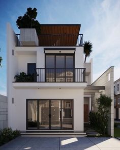 a white two story house with balconies and plants on the balcony