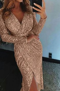 Step into the spotlight with our Women's Sequined Long Sleeve V-Neck Plus Size Party Dress. The alluring combination of sequins, a flattering V-neck, and long sleeves creates a glamorous look for your special occasions. Designed with your curves in mind, this dress offers a stunning silhouette that exudes confidence and style. Make a statement and turn heads at any party or event with this elegant and fashionable ensemble tailored for the plus-size beauty. Sequin V-neck Bodycon Dress For Prom, V-neck Sequin Bodycon Dress For Prom, V-neck Sequin Dress For Prom Season Night Out, V-neck Sequin Dress For Prom Season, Gold V-neck Midi Dress For Party Season, Fitted Maxi Length V-neck Dress For Party, Fall Party V-neck Maxi Dress, Holiday V-neck Evening Dress For Night Out, V-neck Sequin Dress For Cocktail And Prom Season