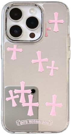 an iphone case with pink crosses on it