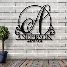 personalized metal monogrammed wall art with the letter d on it's side