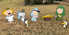 cartoon characters are standing in the grass