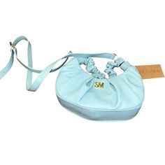 Brand New And Never Used Steve Madden Aqua Blue And Gold Handbag. Small Purse! See Photos For Estimated Lengths. Adjustable Strap For The Perfect Fit. Suede Inside. Adorable Designer Piece. Cute Ruffle Handle. Great For Any Day! Trendy Blue Hobo Bag With Top Handle, Trendy Blue Top Handle Hobo Bag, Light Blue Crossbody Shoulder Bag, Light Blue Evening Bag With Adjustable Strap, Chic Blue Hobo Bag For Errands, Blue Hobo Bag With Removable Pouch For Evening, Evening Blue Hobo Bag With Removable Pouch, Blue Evening Hobo Bag With Removable Pouch, Light Blue Evening Bags With Removable Pouch