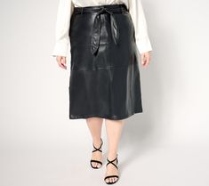 Explore an elegant new side to your style in this belted faux-leather midi, a striking, beautifully constructed selection for the office, celebrations, or date nights. From BEAUTIFUL by Lawrence Zarian. Belt Skirt, Date Nights, Skirt Belt, Faux Leather Skirt, The Office, Your Style, Date Night, Leather Skirt, Dress Skirt