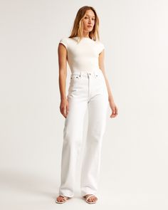 Our classic relaxed jeans in a white wash with a clean hem. This fit features a 10.5” high rise, is fitted at the waist and hips, and eases at the thigh into a relaxed, full-length leg shape. This jean is made from our vintage stretch fabric which features both an authentic vintage look and contains slight built-in stretch for additional comfort. High Rise 90s Relaxed Jean, Jean Fits, Low Rise Baggy Jeans, Perfect Denim, Women's Bottoms, Comfortable Jeans, Relaxed Jeans, Loose Jeans, Denim Outfit