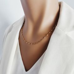 "Cylinder Bar Gold Chain Necklace in 14k Gold Filled - Gold Jewelry Gifts for her - Delicate, classic and elegant necklace for you, mom, bff Chain width: 1.8mm Bar Link length: 5mm Material: 14k Gold Filled Clasp: Spring Ring About \"Gold Filled Jewelry\": Also called rolled-gold. These jewelry items are not actually filled with gold. They are made of a base metal covered by sheets of gold in a mechanical bonding process. Effectively a thick coat of gold: the industry standard for the gold conte Classic 14k Gold Filled Chain Necklace Gift, Elegant 14k Gold-filled Necklace With Figaro Chain, Dainty Paperclip Chain Necklace For Anniversary, Elegant Satellite Chain Necklace As Gift, Dainty Anniversary Necklace With Paperclip Chain, Elegant Figaro Chain Necklace For Anniversary, Elegant 14k Gold-filled Bar Necklace, Dainty Formal Necklace With Paperclip Chain, Elegant 14k Gold Filled Bar Necklace