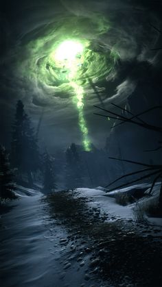 a green light shining in the middle of a dark forest with snow on the ground