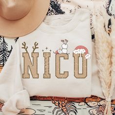 The Fun NICU Nurse Christmas Sweatshirt is the perfect way to spread some holiday cheer among your colleagues and patients. This cozy and comfortable sweatshirt is made from high quality materials that will keep you warm during those cold winter months. Note: ♡ Our products are made to order specially for you. We have included size charts and a quick memo on finding the perfect size!  ♡ We don't accept returns or exchanges. Please check our color and size charts before you place your order :) ♡ School Nurse Gifts, Nurse Funny, Nursing School Gifts, Canvas Learning, School Nurse, Nurse Christmas, Nurse Sweatshirt, Nicu Nurse, Gift For Nurse