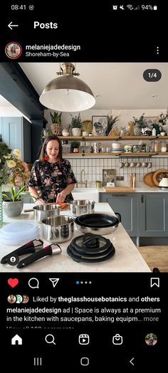 the woman is cooking on the stove in the kitchen