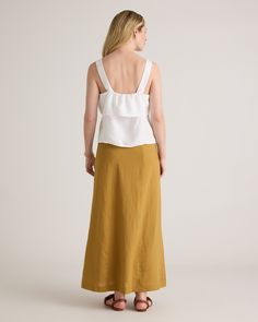 So lightweight and flowy, it's going to be hard to want to wear anything else when the temps rise. Our European Linen Square Neck Tank features a flattering square-neck and adjustable straps and is made from 100% European flax. It's the sustainable, breathable, and versatile linen tank your closet needs.  | Quince | Women's 100% European Linen Square Neck Tank Top in White, Size Small Square Neck Tank Top, Linen Tank, European Linens, Linen Women, Classic Elegance, Quince, A A, Square Neck, Adjustable Straps