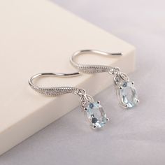 this is natural aquamarine drop earrings ring in prong setting, it is made to order, I can change the design as your idea, just feel free to contact me Main stone: 5*7mm oval cut aquamarine Side stone: cz Metal: sterling silver / 14k gold it is customized, just feel free to contact me for your personalized ring! All HANDMADE ITEMS SHIP IN APPROX 8 DAYS Main Stone: Genuine natural aquamarine Main Stone Size: Oval cut 5 mm x 7 mm Main Stone Weight: 0.76 carat Side Stone: CZ Lenght: about mm Materi Women March, Personalized Ring, March Birthstone, Personalized Rings, Natural Aquamarine, March Birth Stone, Earrings Sterling Silver, 8 Days, Sterling Earrings