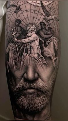 a man's leg with an image of the face of jesus and other people on it