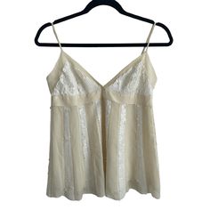 "Beautiful cream white tank top with adjustable spaghetti straps.  BCBG MAXAZRIA.  Babydoll / empire waist.  100% silk, lined with rayon.  Striped sequin segments on body and bust.  No size tag, fits like a 2/4.  Length 19\" not including the strap (measured from the top of the bust triangle). Pit to pit 16.5\". Under bust 15.5\".  In excellent condition. Rarely (if ever) worn. Personally owned." Vintage Overalls, Cream White Color, White Colour, White Tank Top, White Tank, Empire Waist, Cream White, Womens Tank, Size Tag