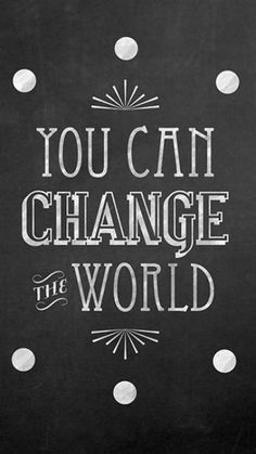 you can change the world written on a blackboard with white polka dots in it