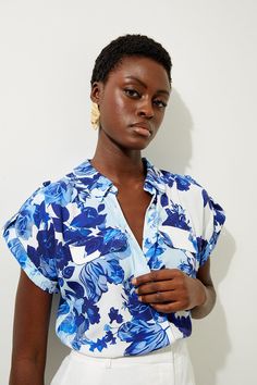 Floral Printed Viscose Crepe Woven Shirt Blue Summer Blouse With Collared Neckline, Blue Collared Blouse For Summer, Blue Collared Neckline Summer Blouse, Chic Tops With Floral Print And Collared Neckline, Blue Collared Blouse For Spring, Blue Collared Blouse For Vacation, Summer Floral Print Collared Top, Summer Floral Print Tops With Collared Neckline, Summer Floral Print Top With Collared Neckline