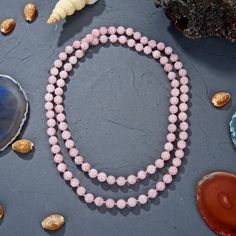 "36\" length.   -8MM natural rose quartz beads in a matte or polished finish. -Hand-knotted thread between each bead in pink thread. https://www.etsy.com/shop/MYGEMSROCK" Pink Long Necklace With Gemstone Beads, Pink Necklaces With 8mm Beads, Pink 8mm Beaded Necklace, Pink Gemstone Beads Long Necklace, Pink Rose Quartz Gemstone Beaded Necklaces, Spiritual Pink Rose Quartz Beaded Necklace, Pink Rose Quartz Gemstone Beaded Necklace, Pink Rose Quartz Single Strand Jewelry, Pink Rose Quartz Spiritual Beaded Necklace