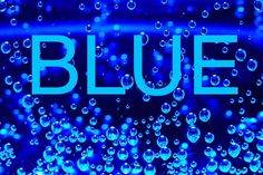 the word blue written in water bubbles