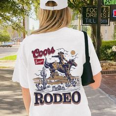 Coors Rodeo 90s Cowboy T-shirt -printwithSKY – printwithsky Retro Summer T-shirt For Rodeo, Rodeo Screen Print Crew Neck Top, Vintage Summer T-shirt For Rodeo, Affordable Vintage T-shirt For Rodeo, Retro Rodeo T-shirt With Screen Print, Rodeo Cowboy, Vintage Inspired Design, Vintage Tees, Workout Tee