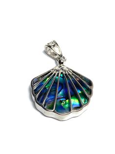 Sea shell Abalone mother of pearl pendant Item is made of natural abalone shell Price is per abalone pendant Sterling silver bail 1 11/16 inch long with bail 1 1/16 inch wide 4.47 mm thick BAIL : 6.90mm SKU# M990 We ship in from Hawaii by First Class Airmail 1-3 days after receiving your order. Shipping to the USA Mainland usually takes 3 to 5 days. All our pearl pictures are taken in bright light. We try and give you the best representation of what the pearls look like in person. Please note th Mother Of Pearl Shell Pendant With Pearl Detail, Silver Abalone Shell Necklace Gift, Silver Abalone Shell Pendant Necklace, Handmade Silver Shell Pendant, Handmade Silver Pendant Shell, Silver Shell With Pearl Pendant, Silver Shell Gift, Silver Mother Of Pearl Shell Gift, Elegant Silver Abalone Shell