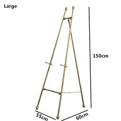 a gold metal easel with measurements for the top and bottom, on a white background