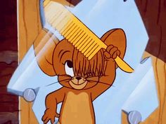 a cartoon mouse with a comb on its head