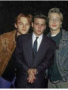 three young men posing for a photo in front of an instagram post on twitter