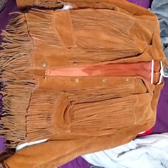 This Jacket Appears To Be Brand New. My Great Aunt Had It In Her Closet When We Inherited The Home Over 10 Years Ago. According To Older Family Members She Had It Made Sometime In The 70s Or 80s, Although No One Knows For Sure How Old It Really Is. Like Many Things She Owned, She Likely Wore It Only Once Or Twice. It Is A Size 16 And Usa Made. The Buttons Say Rau Co. On The Back, And On The Inside Behind The Fabric There Are Marks From The Original Makers. (See Pic) The Original Price Is Unknown Brown Leather Outerwear For Western-themed Events, Western Leather Outerwear For Ranch, Western Leather Outerwear For Rodeo, Western Style Leather Outerwear For Rodeo, Brown Leather Outerwear For Ranch, Brown Western Outerwear For Rodeo, Western Brown Outerwear For Rodeo, Western Brown Rodeo Outerwear, Western Style Brown Outerwear For Rodeo