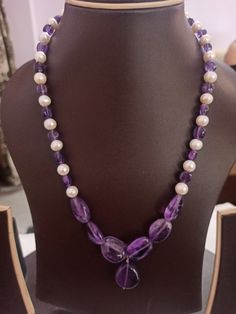 Amethyst Necklace Smooth AAA Tumble Beads With Center Tumble Gemstone 20 inch Necklace Stone : Natural Amethyst Fresh Water Pearl Shape :- Tumble Size :- 7x7-14x18mm 1. Weight :- 237 carat With Amethyst Tumble, 20 INCH Necklace Polish :- Handmade Purity :- 100% Natural Gemstone color - white blue It is known as the 'love stone' as the message it emits is the strong vibration of unconditional love, joy, warmth and healing. As quartz crystals are profound amplifiers of energy, it may help to kindl Amethyst Tumbled, 20 Inch Necklace, Necklace Stone, Fresh Water Pearl, Quartz Crystals, Emerald Stone, Amethyst Necklace, Unconditional Love, Blue Beads