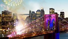 fireworks light up the night sky over brooklyn bridge and new york cityscape in the background