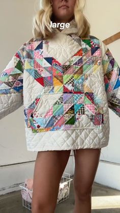 Fabric: Made from soft, quilted fabric that provides warmth and comfort without sacrificing style. Design: Featuring a bold multicolor block pattern, this sweatshirt brings a modern twist to casual wear. The quilted texture adds depth and dimension, while the relaxed fit ensures effortless style. Occasions: Perfect for weekend errands, casual hangouts, or cozy nights in. Make a statement with the Multicolor Block Quilted Sweatshirt. Size Chart : Size International Size Conversion Body Measuremen White Cotton Quilted Jacket For Fall, Multicolor Color Block Cotton Sweatshirt, Casual Multicolor Quilted Jacket For Fall, Multicolor Patchwork Quilted Jacket For Winter, Multicolor Patchwork Quilted Winter Jacket, White Long Sleeve Hoodie With Patchwork, Cotton Crew Neck Outerwear With Patchwork, Casual Quilted Cotton Tops, Multicolor Long Sleeve Quilted Jacket