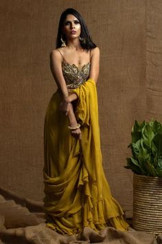 Shop for Kanj by Priyanka A Sakhuja Yellow Georgette Ridha Pre-draped Saree With Embroidered Blouse for Women Online at Aza Fashions Noodle Strap Blouse, Couture Bridesmaid, Saree Gowns, Noodle Strap, Cotton Sarees Handloom, Strap Blouse, Embroidered Leaf, Yellow Leaf, Ruffle Saree