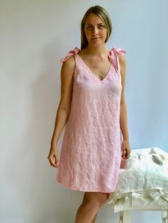 "Romantic pink linen night gown. Nightgown with regulating straps. Made from 100% pure linen. Simple. Eco-conscious. Smart choice. Available in soft white, creamy peach, natural taupe and black linens. For the best fitting of this dress please let us know the following measurements: - your height - your bust/waist/hip circumferences Each piece is individually cut, sawn and pre-washed. We really love making dresses for various sizes - from petit to plus size and more. Please allow for up to 10 DA Summer Linen Sleep Dress, Pink Linen Dress For Vacation, Pink V-neck Linen Dress For Beach, Sleeveless Spring Dress For Relaxation, Sleeveless Spring Dress For Casual Wear, Feminine Linen Dress For Vacation, Linen Sleeveless Dress For Loungewear, Feminine Linen Beach Dress, Linen Sleeveless Loungewear Dress