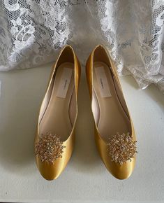 "Beautiful and elegant almost Flat Satin Shoes, heel is only 1/2\" it adds beauty and elegance to this classic style; crystals embellishment only GOLD Color; shoes pictured Gold/Mustard color, i suggest to order color swatches samples if, you need a close match to your color, below find the link to order color swatches. BY PURCHASING THIS LISTING, YOU AGREE TO HAVE READ ALL INFORMATION, AND SHOP POLICIES. THANK YOU! EVERY SHOES ORDER IS HAND EMBELLISHED IN ORDER OF ARRIVAL THEREFORE, SHOES CAN N Yellow Wedding Shoes, Shoe Makeover, Golden Shoes, Harvest Gold, Color Shoes, Satin Shoes, Shoes Heel, Flat Shoe, Mustard Color