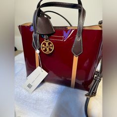 Nwt Tory Burch Perry Patent Small Triple Compartment Tote. Royal Burgundy. Shoulder Strap Dimensions In Pictures. #Torybirch #Luxuryhandbag Tory Burch Robinson Tote, Ella Tote, Felt Tote, Laptop Travel Bag, Winter Bags, Tory Burch Tote, Tory Burch Bag Totes, Grey Tote, Quilted Tote Bags