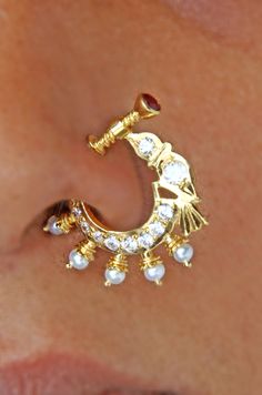 22 Karat Gold Nath - Nose Ring with Cz , Ruby & Pearls  - 235-GNP009 - in 3.500 Grams for USD $339.05. 
Made in India by Totaram Jewelers Online this product is in Gold - 22 Karat BIS Hallmark 916 KDM Gold  & is an excellent gift for Adult - Women. Ships fully insured with secured guaranteed delivery for free with your order over $250 from New Jersey USA & comes with 30 days exchange policy. Gold Diamond Nose Ring For Wedding, Cubic Zirconia Nose Rings With Prong Setting For Wedding, Wedding Nose Rings With Cubic Zirconia Prong Setting, Wedding Yellow Gold Diamond Nose Rings, Gold Diamond Wedding Ring With Stone Setting, Gold Diamond Nose Ring Gift, Traditional Gold Cubic Zirconia Wedding Jewelry, Gold Cubic Zirconia Nose Rings For Wedding, Gold Cubic Zirconia Wedding Nose Ring