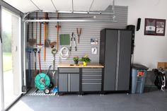 a garage with lots of storage and tools